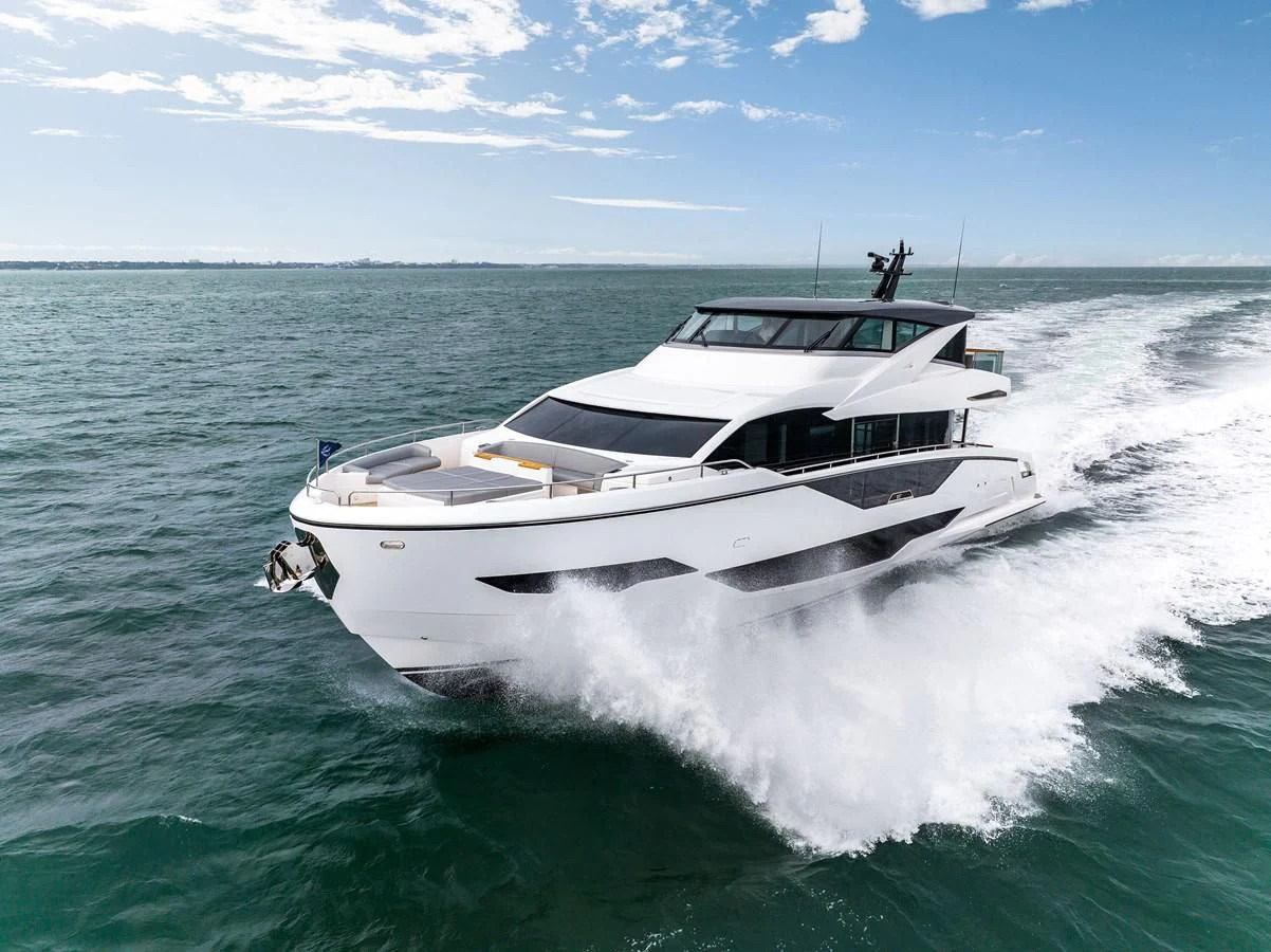 a white yacht on the water aboard WORTH THE WAIT Yacht for Sale