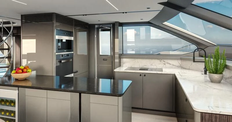 a kitchen with a large island aboard WORTH THE WAIT Yacht for Sale