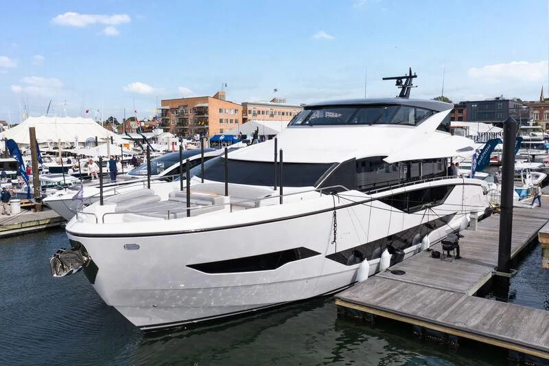 a boat docked at a pier aboard WORTH THE WAIT Yacht for Sale