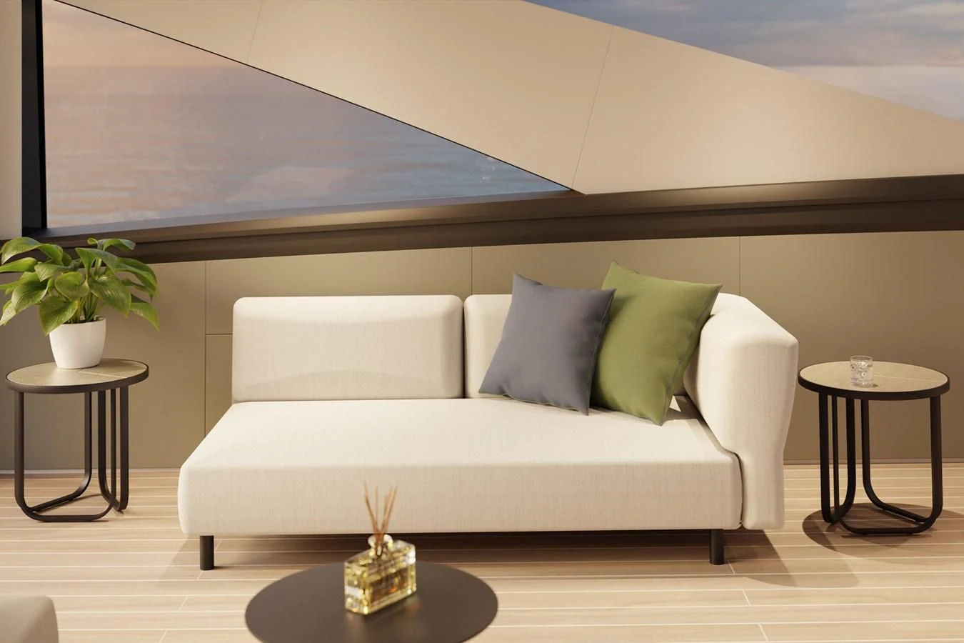 a white couch with a table and a plant in the background aboard WORTH THE WAIT Yacht for Sale