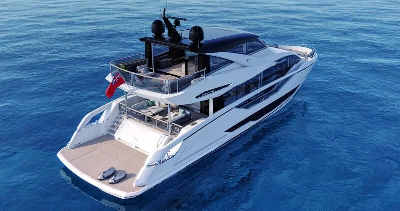 a white boat on the water aboard WORTH THE WAIT Yacht for Sale