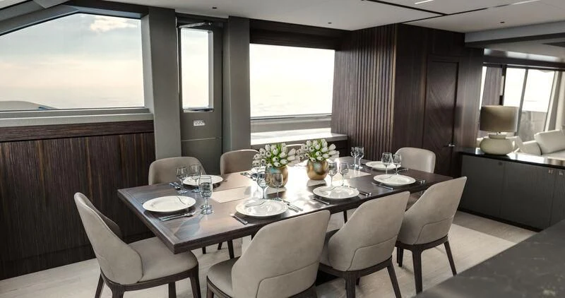 a dining room with a table set aboard WORTH THE WAIT Yacht for Sale