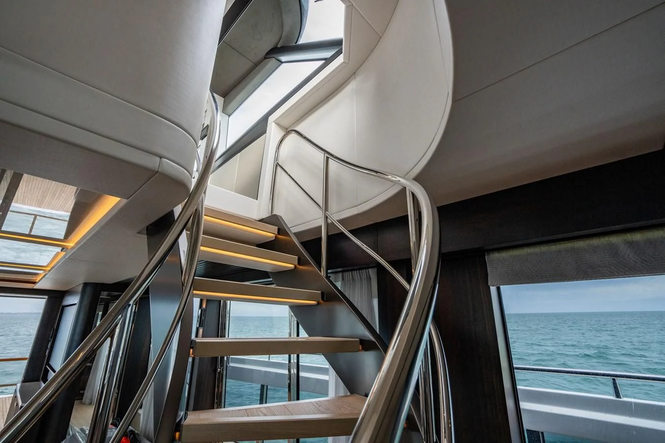 a staircase with a railing aboard WORTH THE WAIT Yacht for Sale