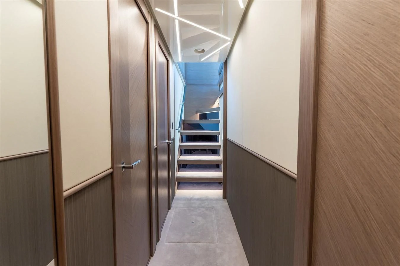 a hallway with wooden doors aboard WORTH THE WAIT Yacht for Sale