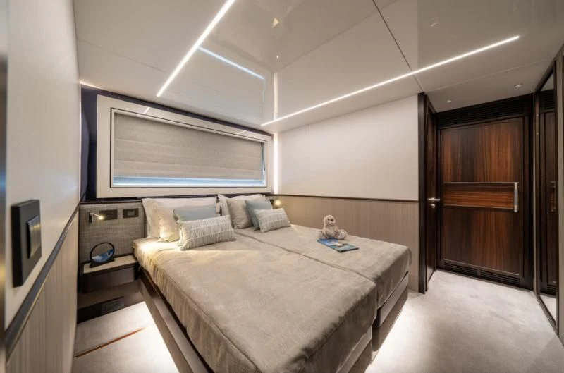 a bed in a room aboard WORTH THE WAIT Yacht for Sale