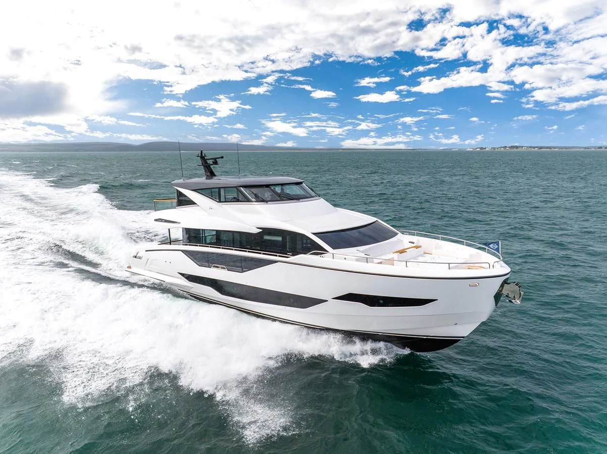 a white yacht on the water aboard WORTH THE WAIT Yacht for Sale