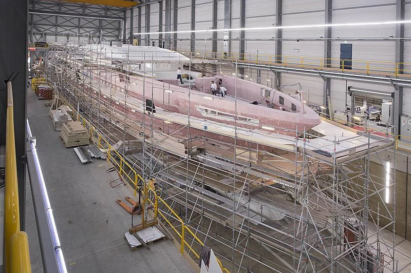 a large machine in a factory aboard JUNO Yacht for Sale