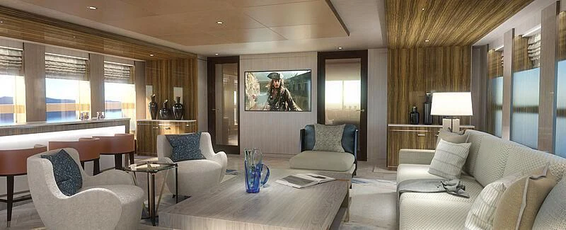 a living room with a large screen aboard JUNO Yacht for Sale