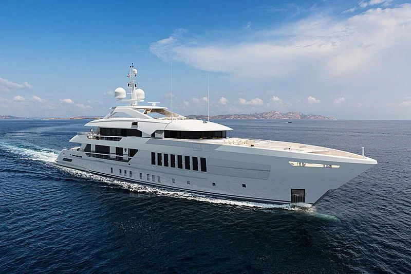 a large white ship in the water aboard JUNO Yacht for Sale