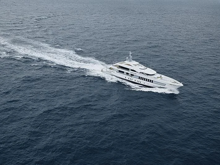 a white boat in the water aboard JUNO Yacht for Sale