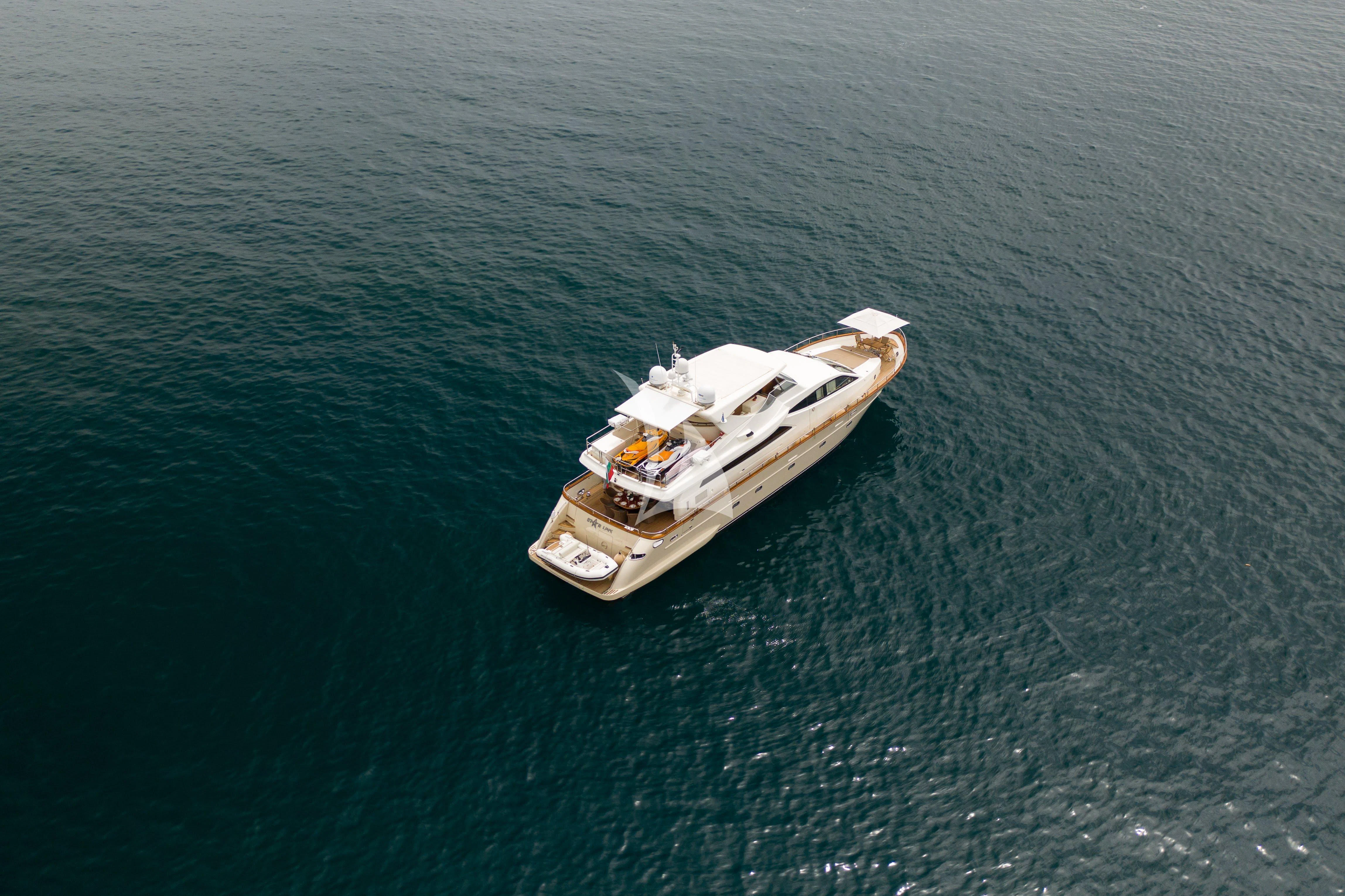 a boat in the water aboard STAR LINK Yacht for Sale