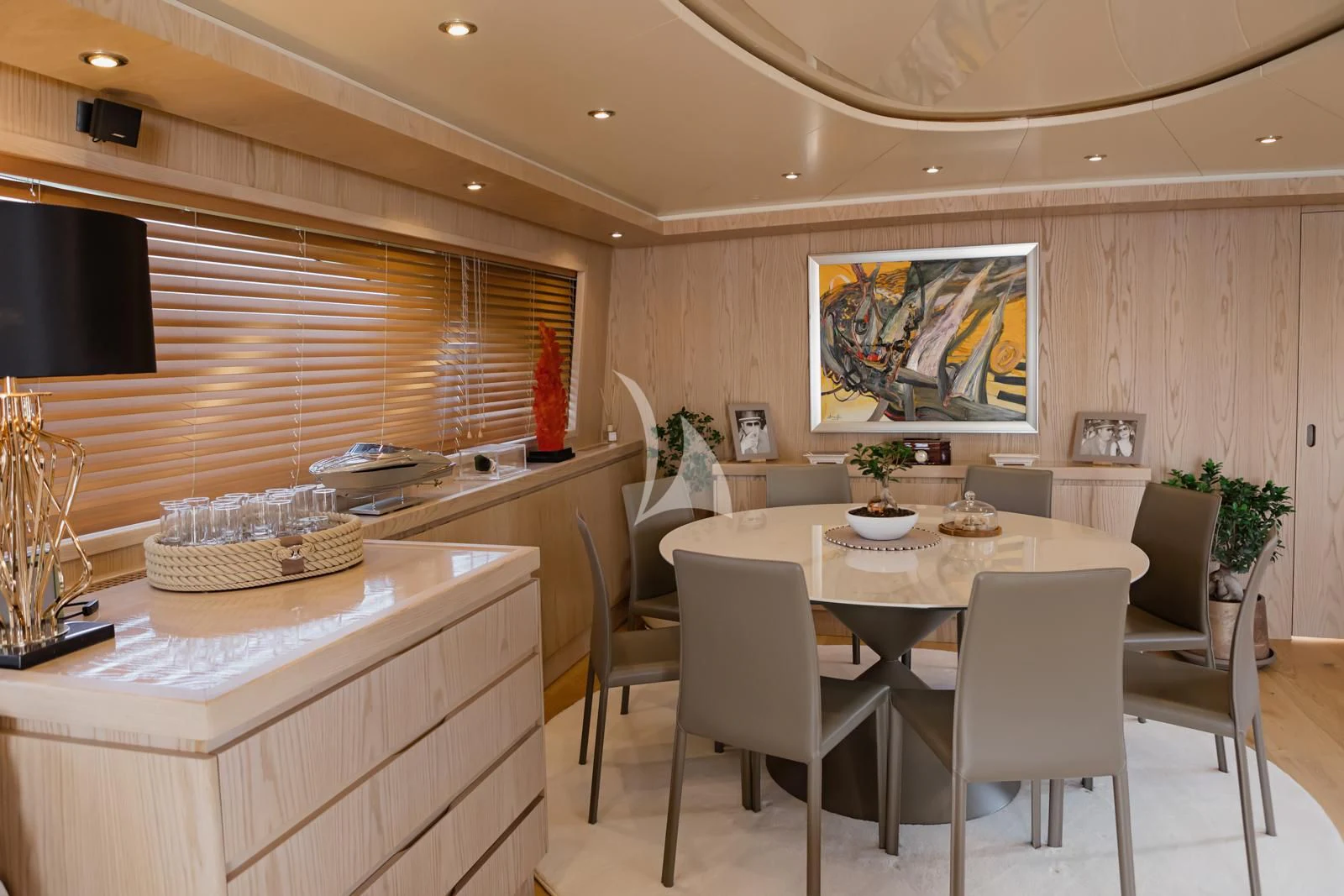 a kitchen with a table and chairs aboard STAR LINK Yacht for Sale