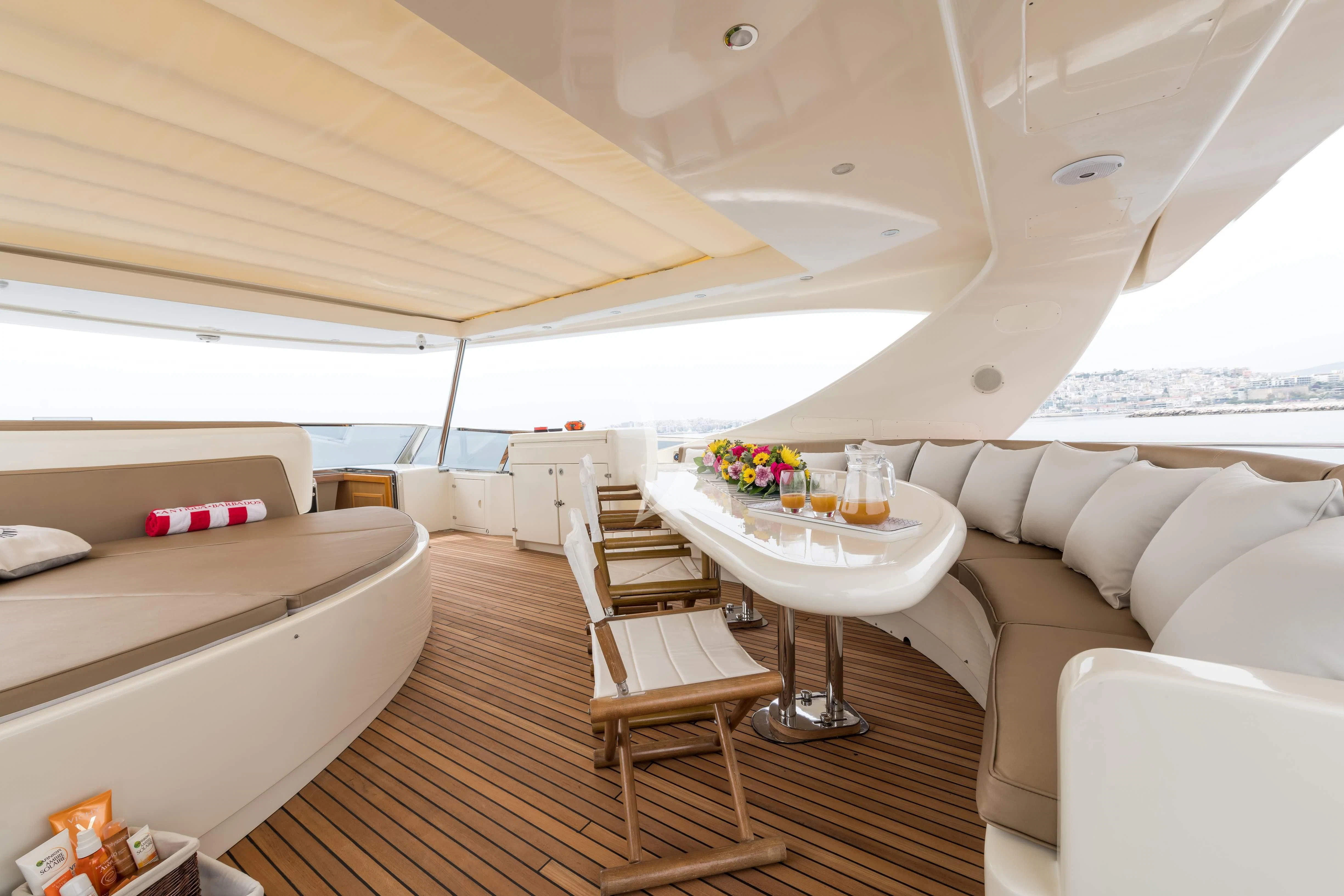 a room with a couch and a table aboard STAR LINK Yacht for Sale