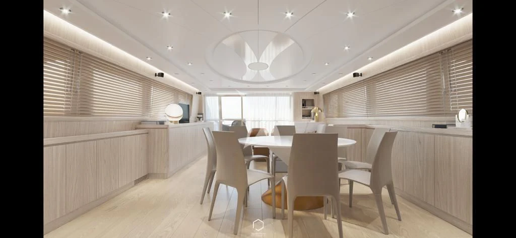 a room with white chairs and a table with white chairs aboard STAR LINK Yacht for Sale