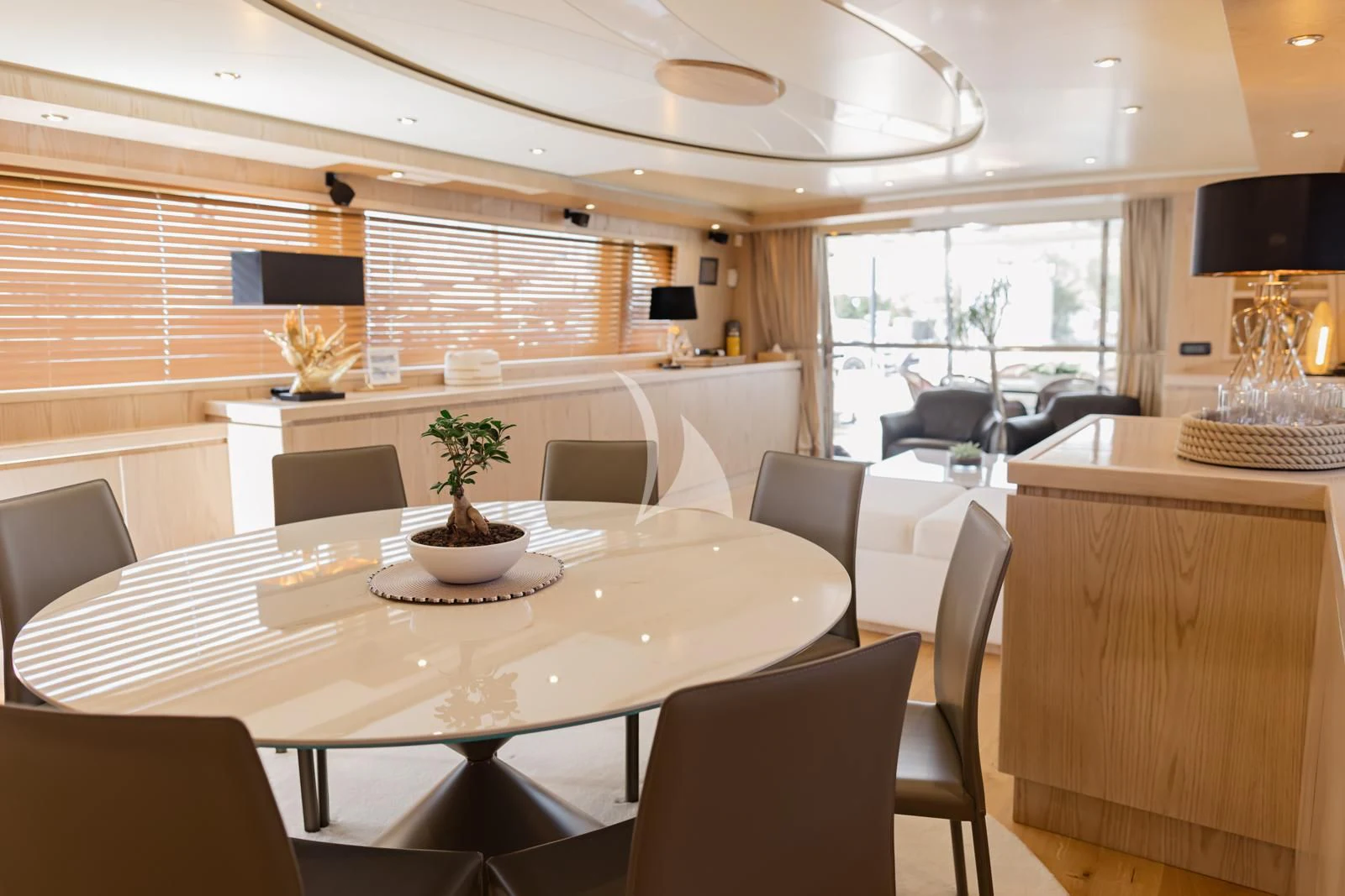 a room with tables and chairs aboard STAR LINK Yacht for Sale