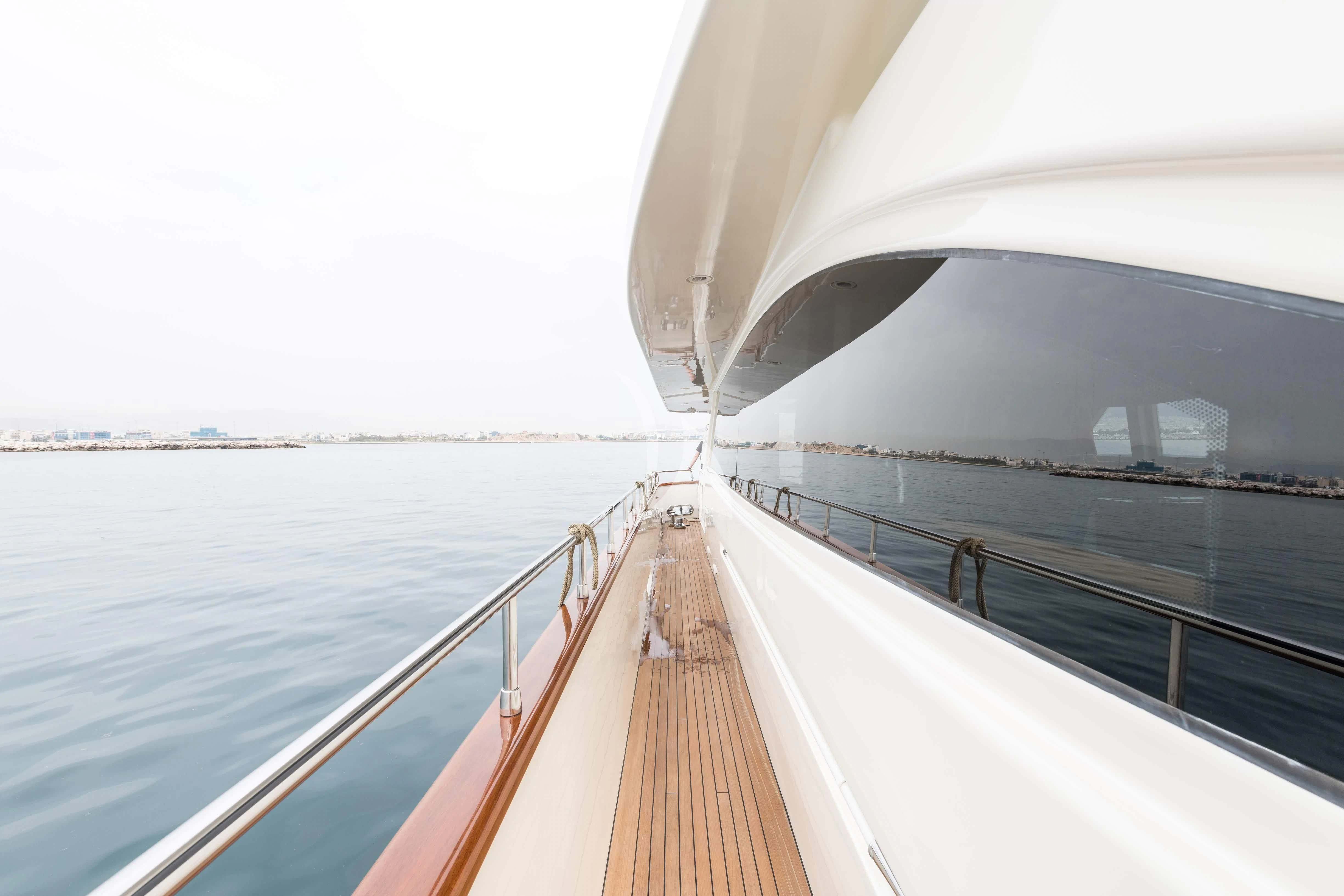 a long wooden walkway on a boat aboard STAR LINK Yacht for Sale