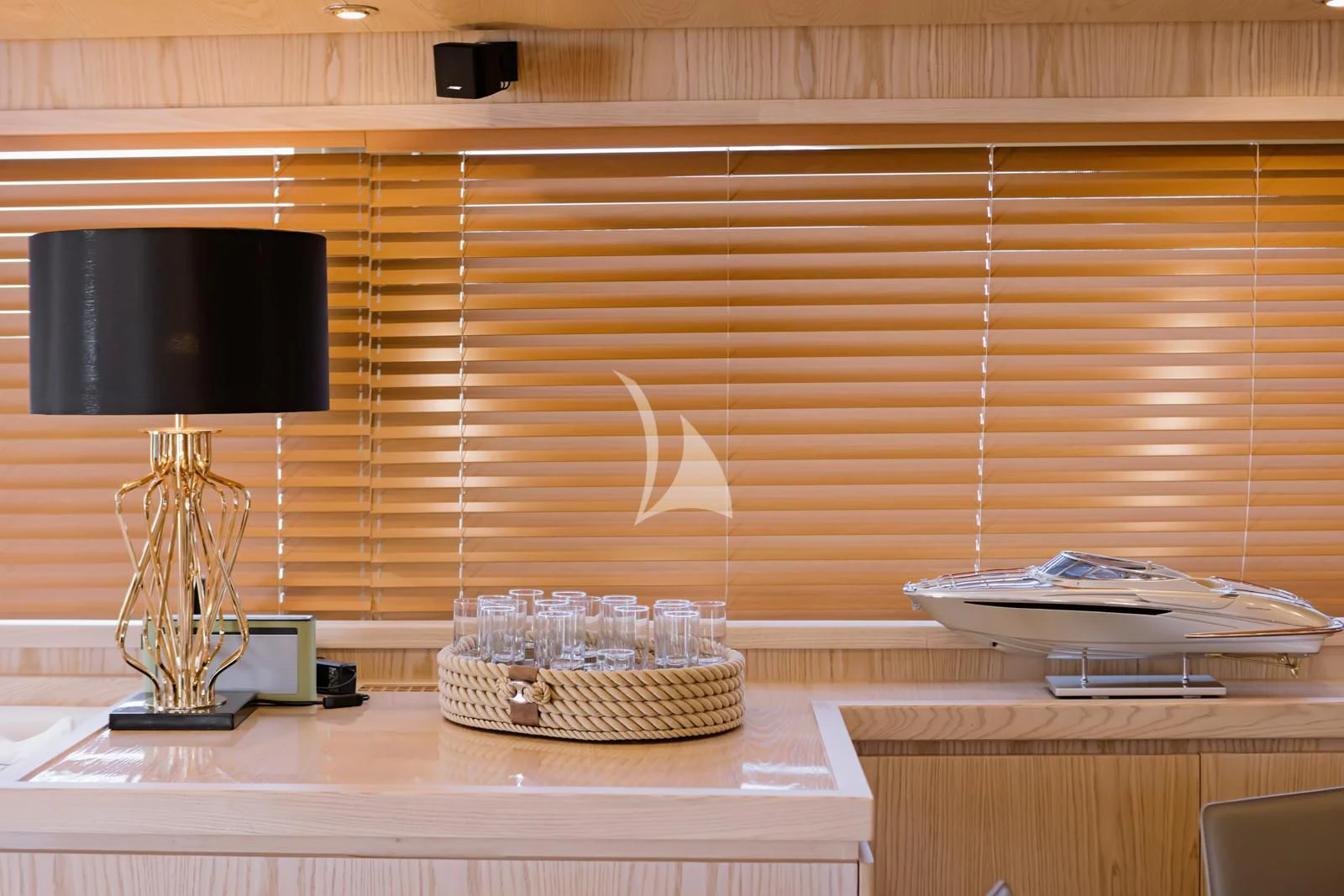 a kitchen counter with a television and a basket aboard STAR LINK Yacht for Sale