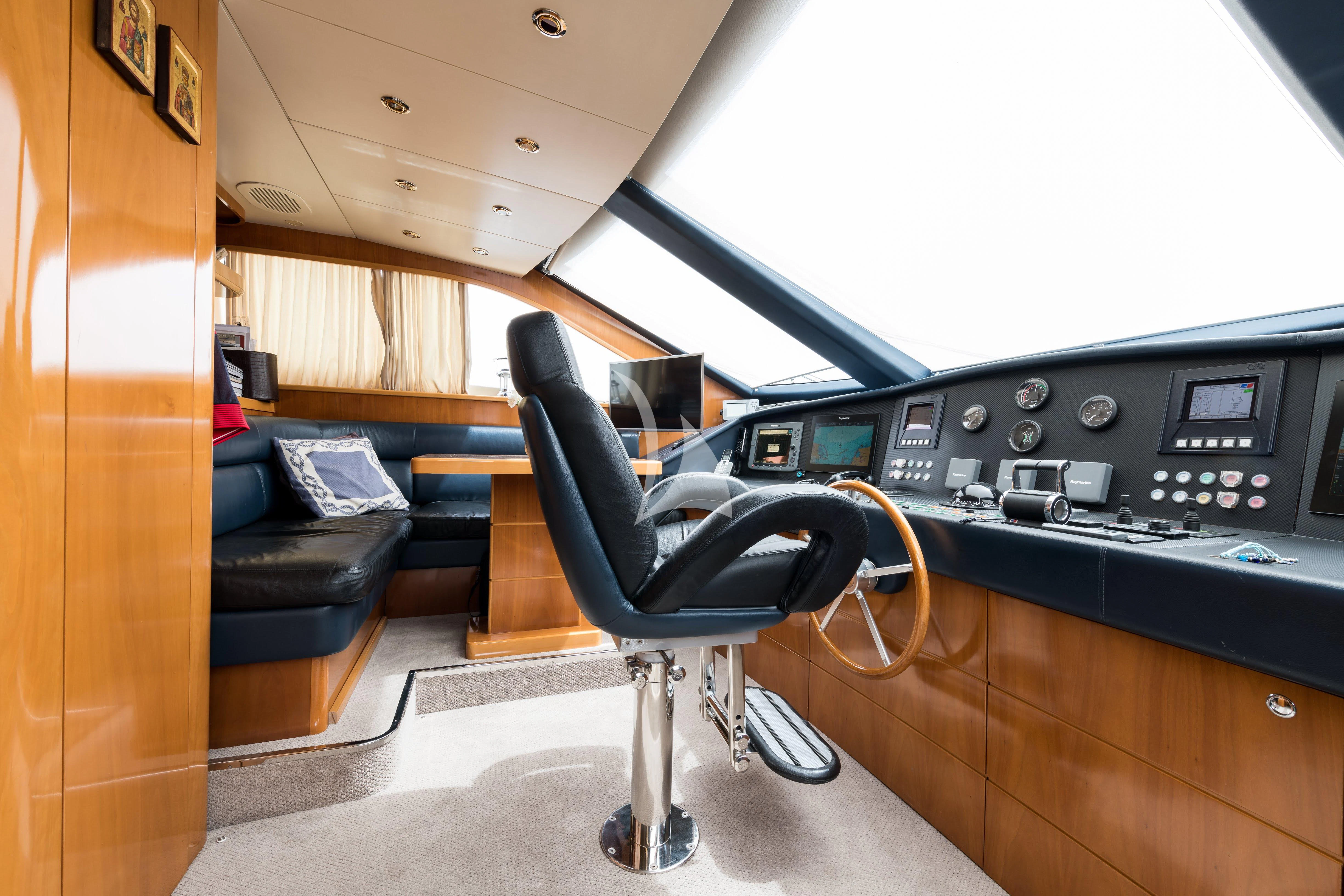a black chair in a room aboard STAR LINK Yacht for Sale