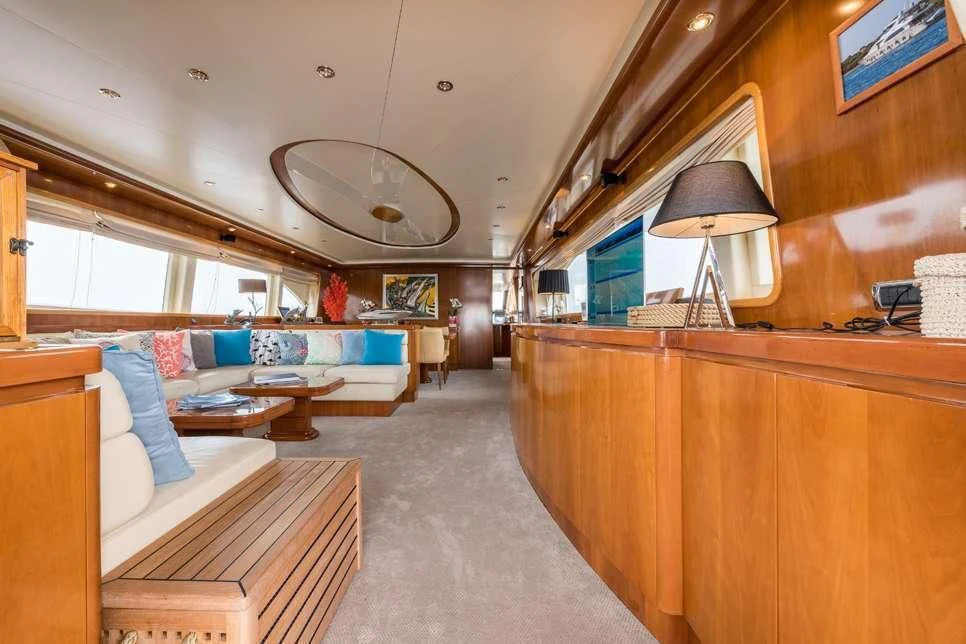 a room with a bed and a desk aboard STAR LINK Yacht for Sale