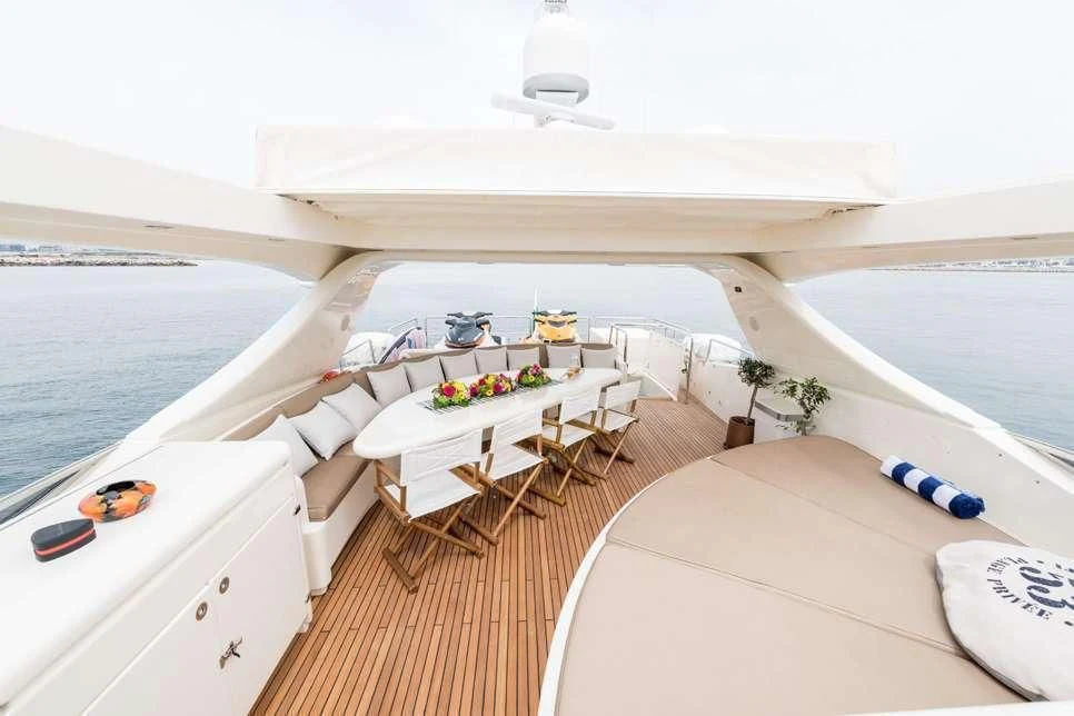 a room with a table and chairs on it aboard STAR LINK Yacht for Sale