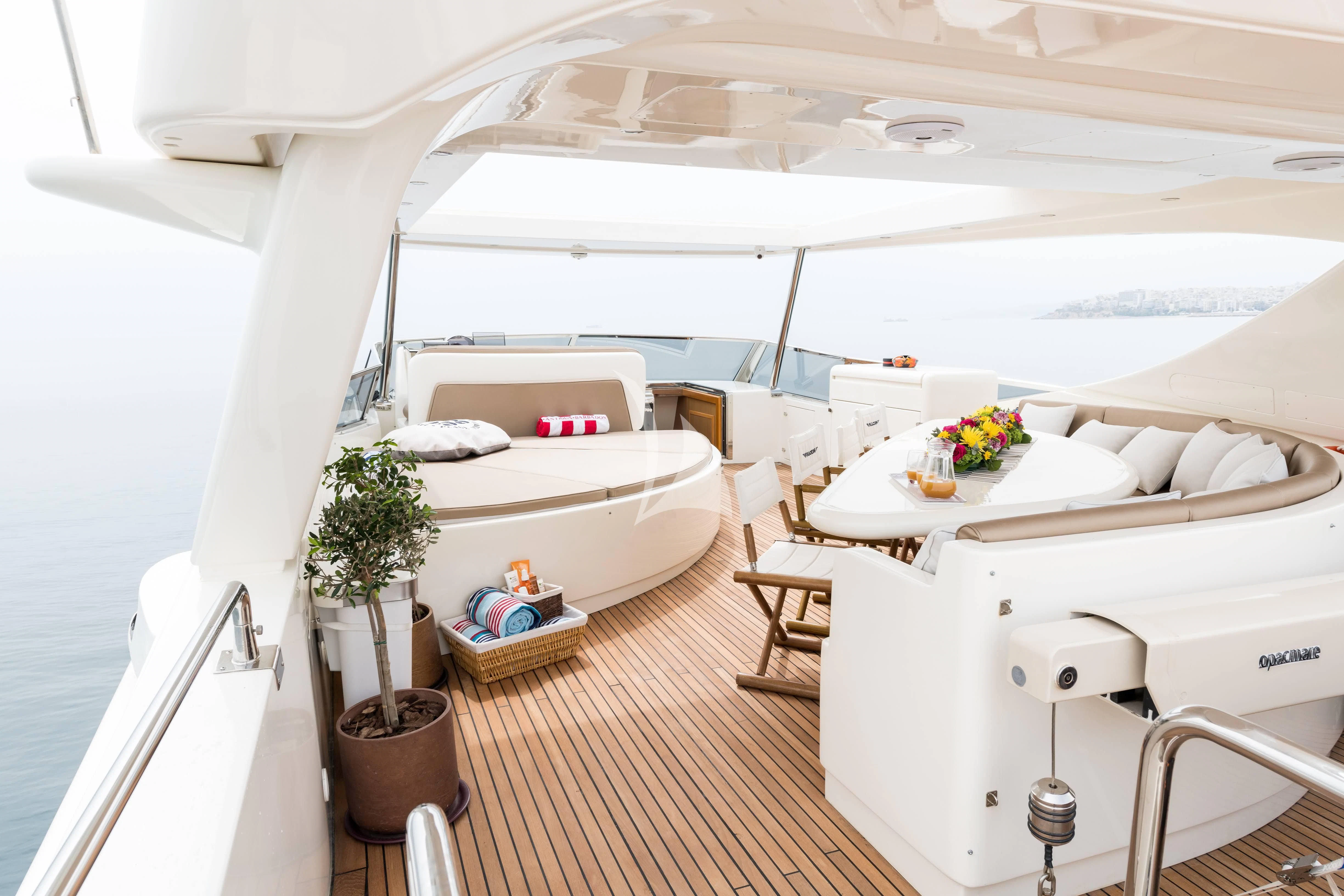 a room with a bed and a table aboard STAR LINK Yacht for Sale