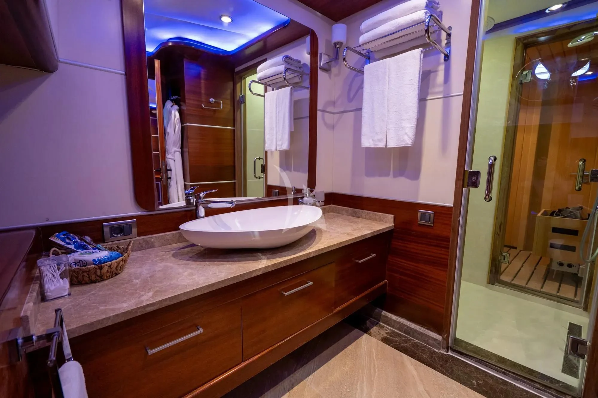 a bathroom with a sink and mirror aboard LA BELLA VITA Yacht for Sale