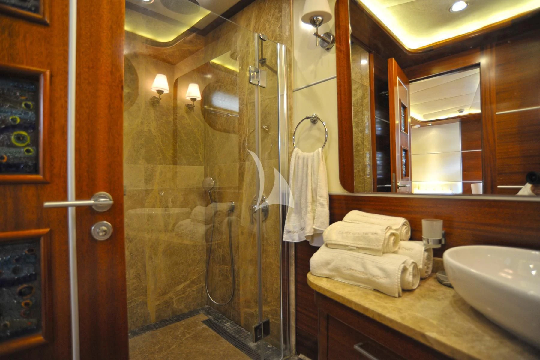 a bathroom with a sink and a shower aboard LA BELLA VITA Yacht for Sale