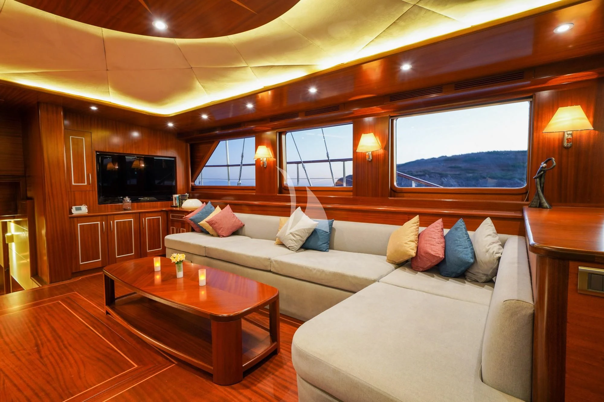 a living room with a large window aboard LA BELLA VITA Yacht for Sale