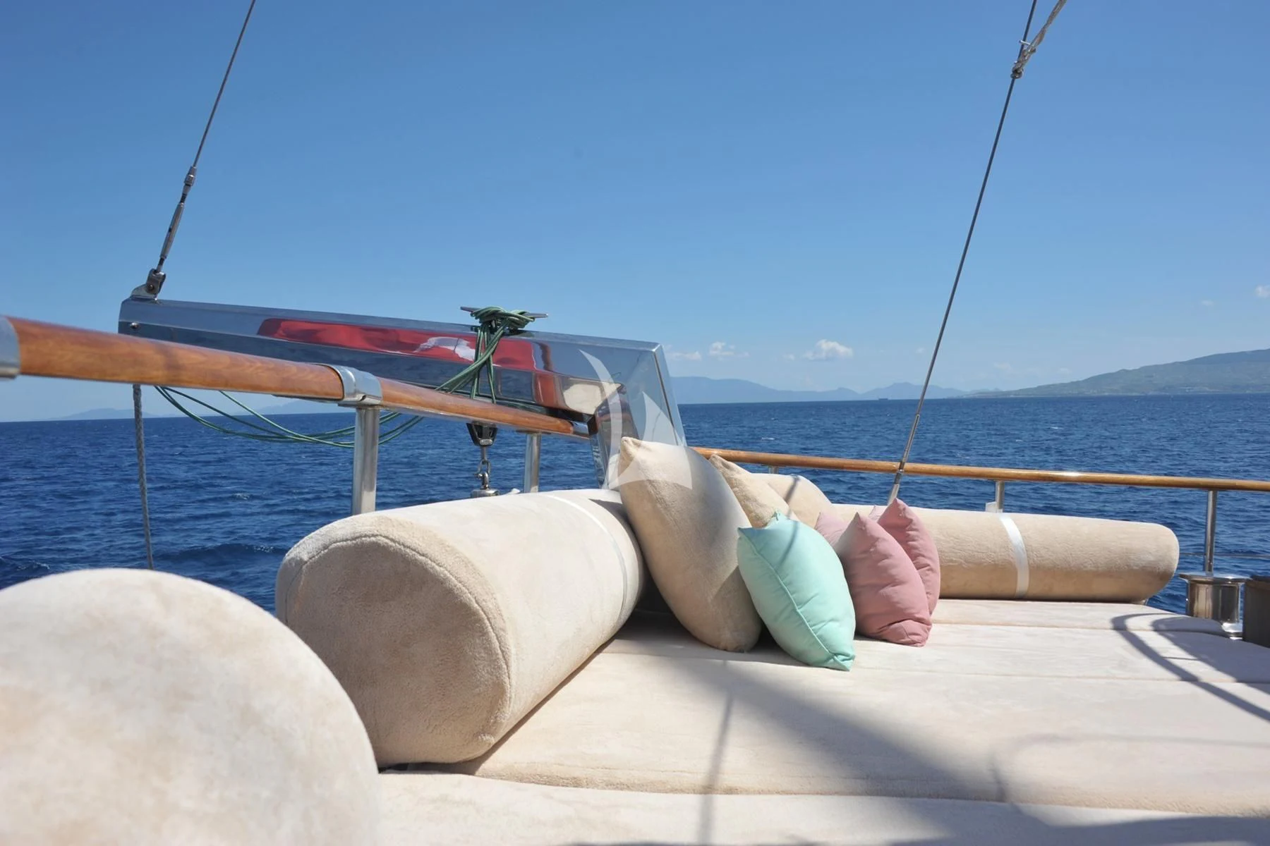 a person lying on a boat aboard LA BELLA VITA Yacht for Sale