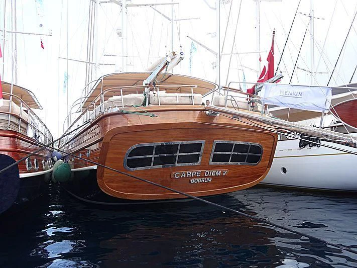 a couple of boats sit in the water aboard LA BELLA VITA Yacht for Sale