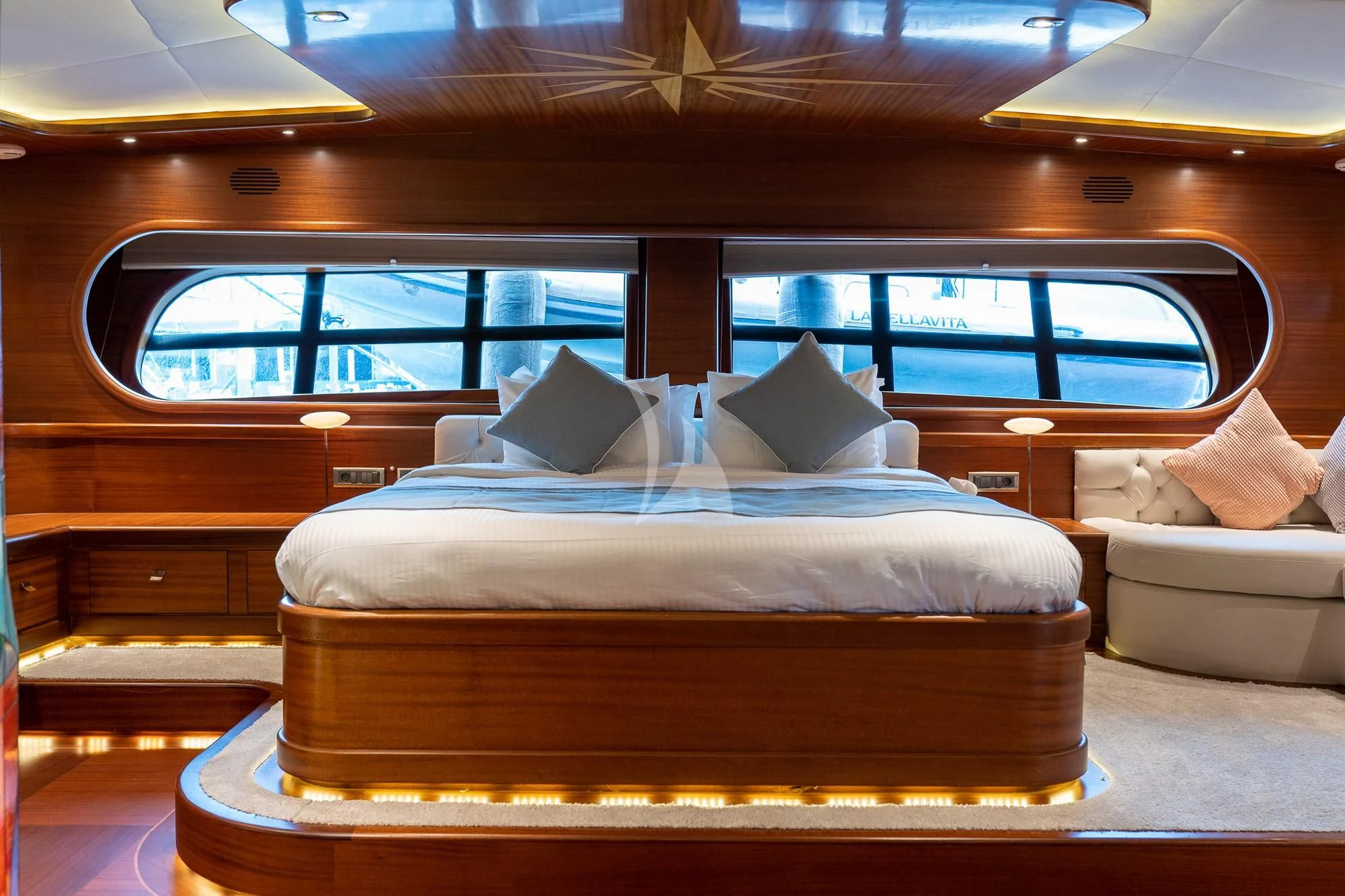 a bed in a room aboard LA BELLA VITA Yacht for Sale