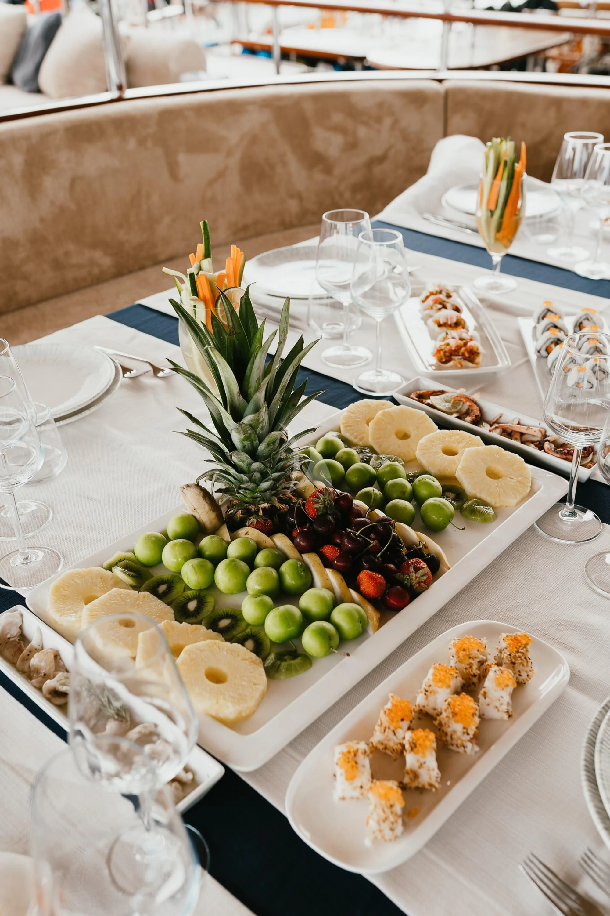 a table with food on it aboard LA BELLA VITA Yacht for Sale