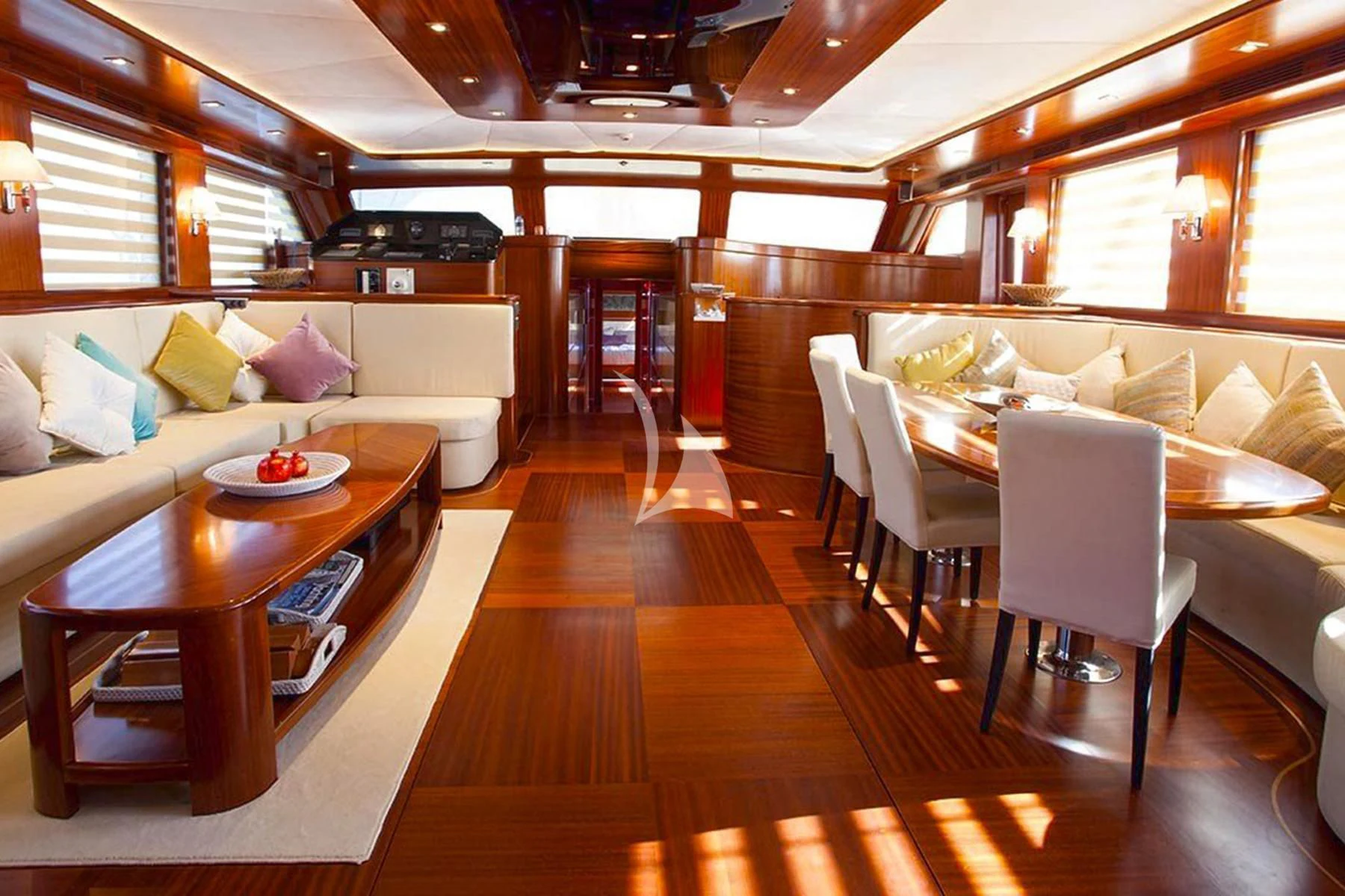 a living room with a wood floor aboard LA BELLA VITA Yacht for Sale