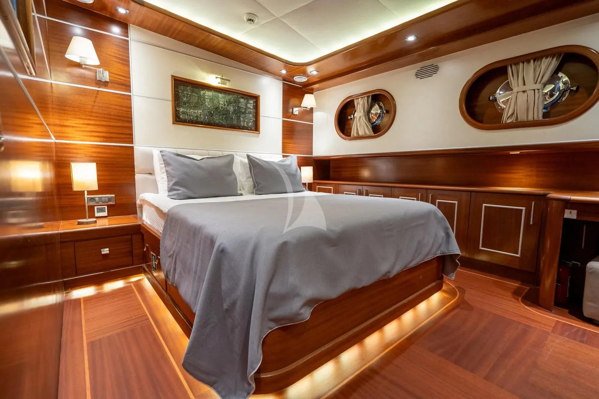 a bed in a room aboard LA BELLA VITA Yacht for Sale