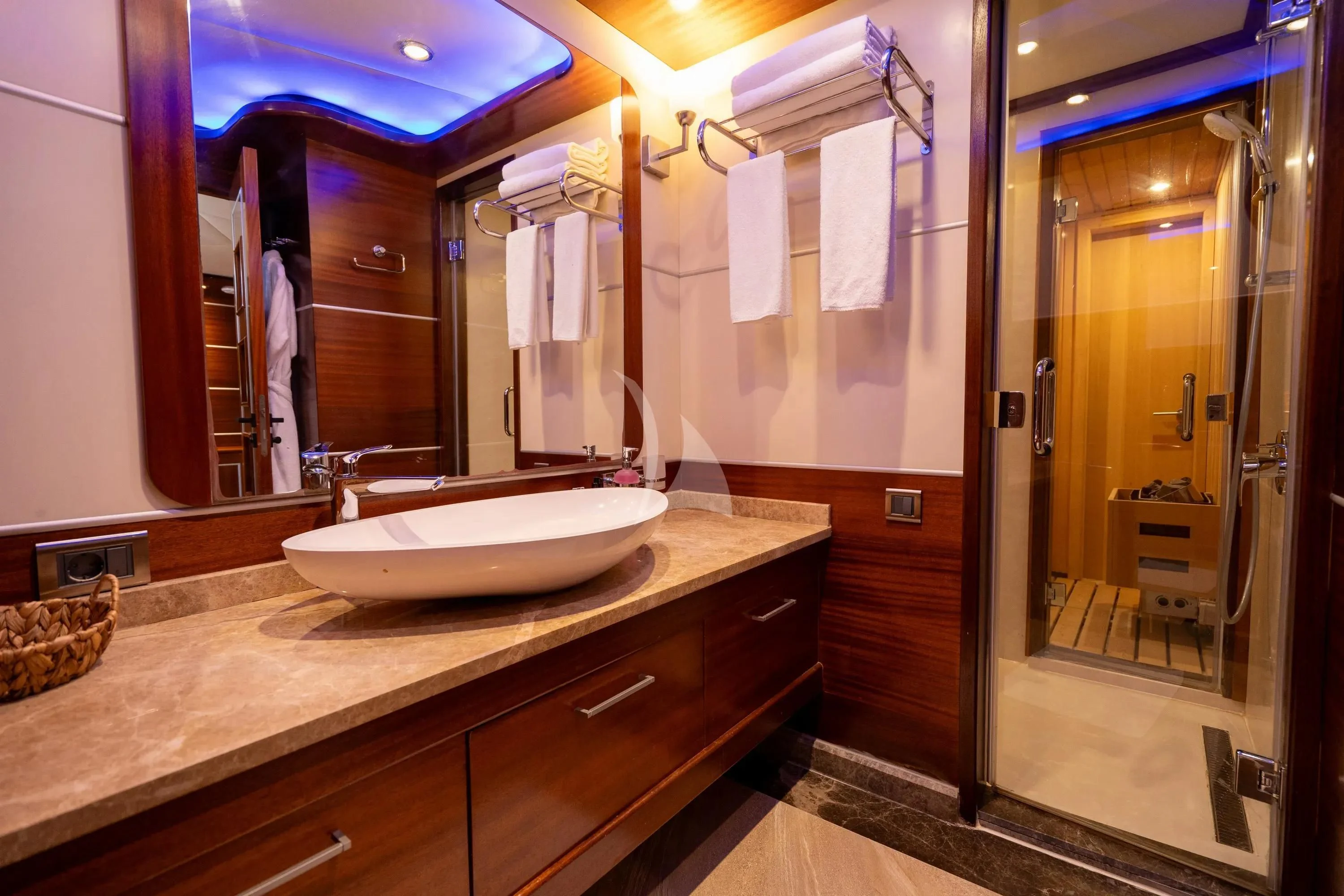a bathroom with a sink and a mirror aboard LA BELLA VITA Yacht for Sale