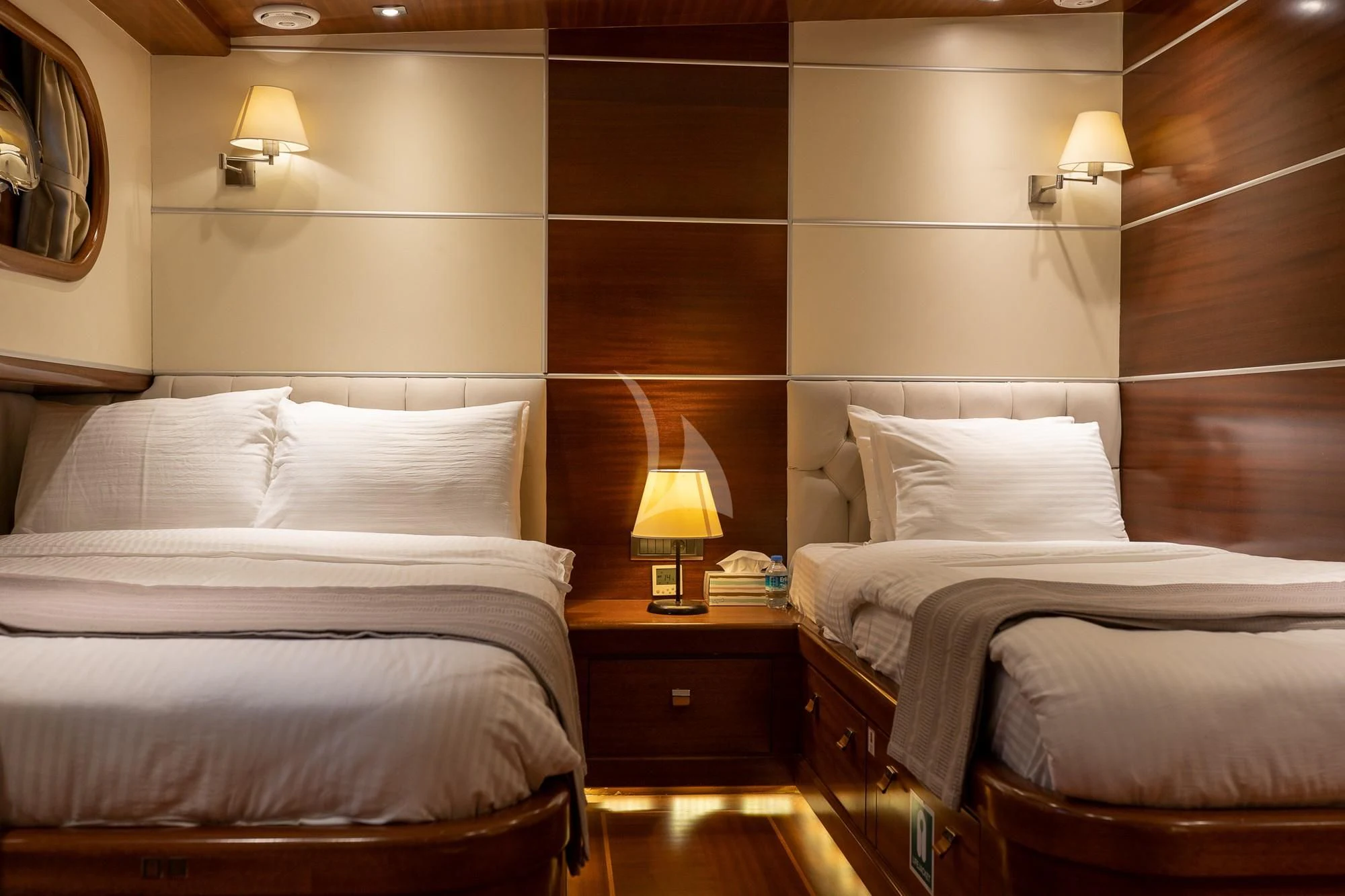 a couple of beds in a hotel room aboard LA BELLA VITA Yacht for Sale