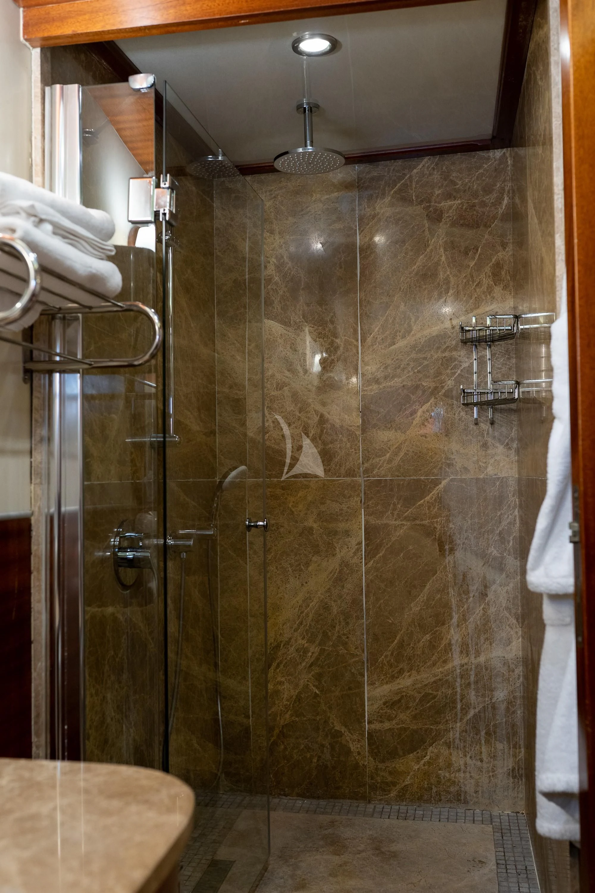 a shower with glass doors aboard LA BELLA VITA Yacht for Sale