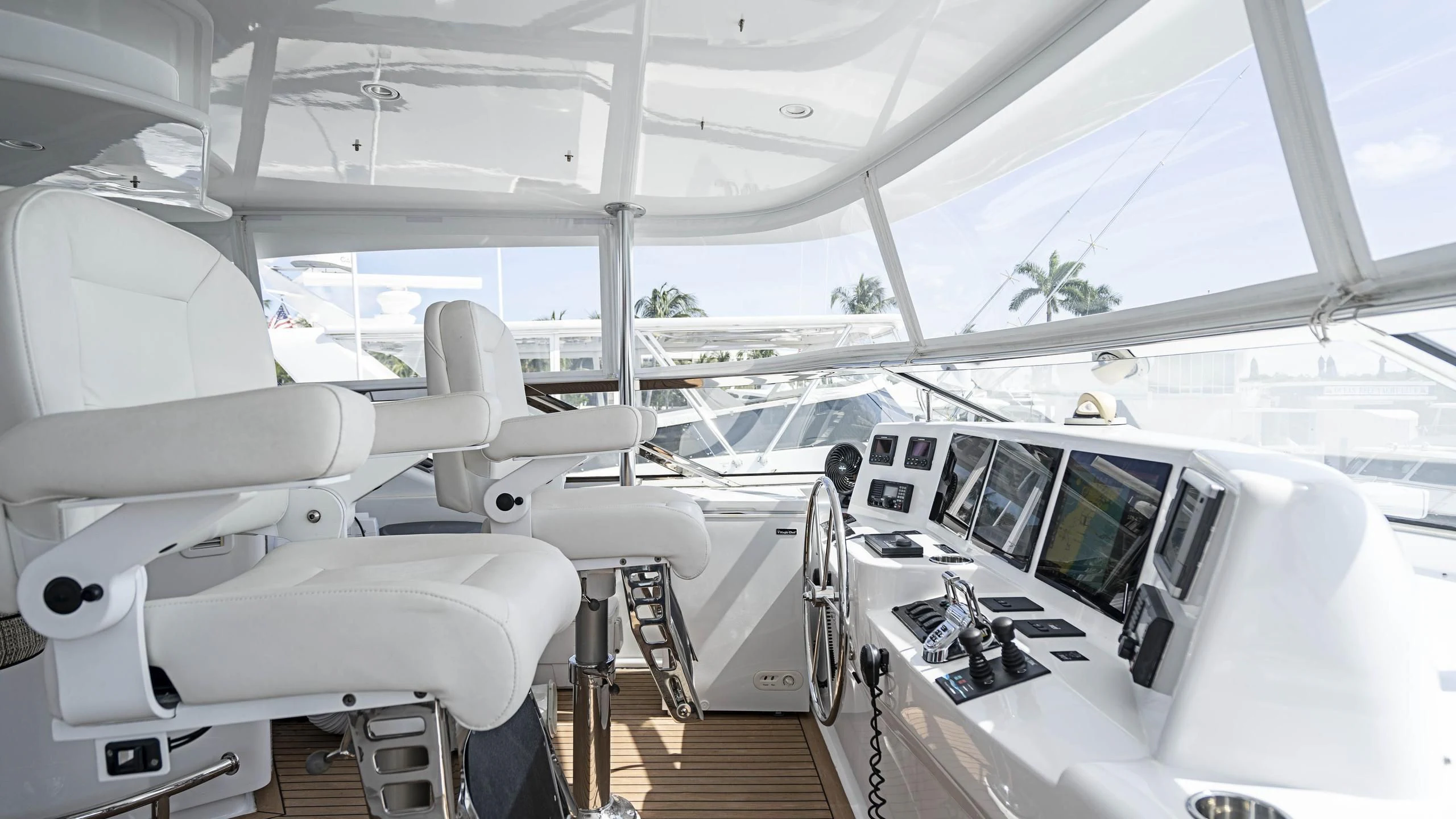 inside of a white car aboard AL-JUBAIL Yacht for Sale