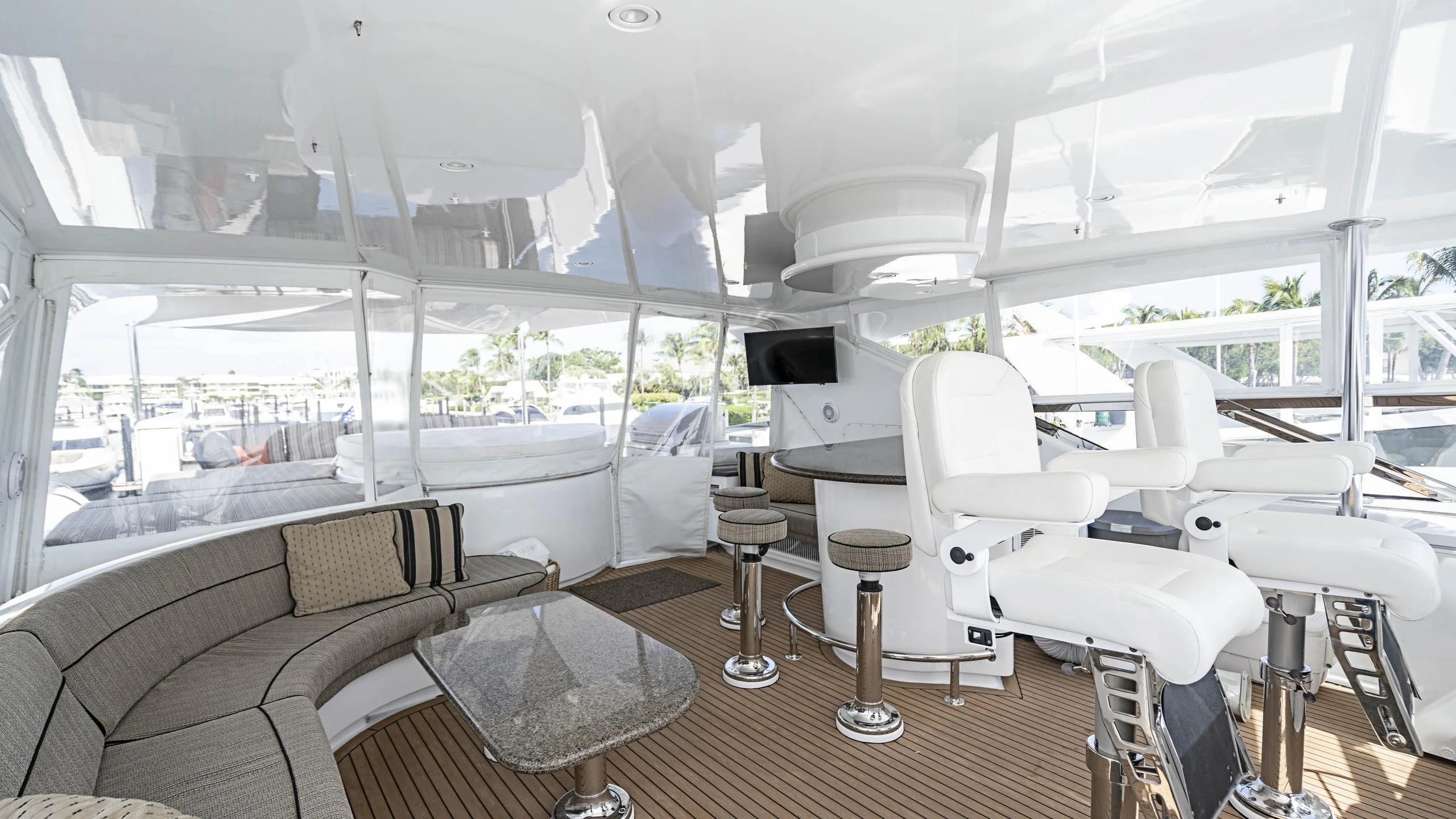 a room with a couch and a table and chairs aboard AL-JUBAIL Yacht for Sale