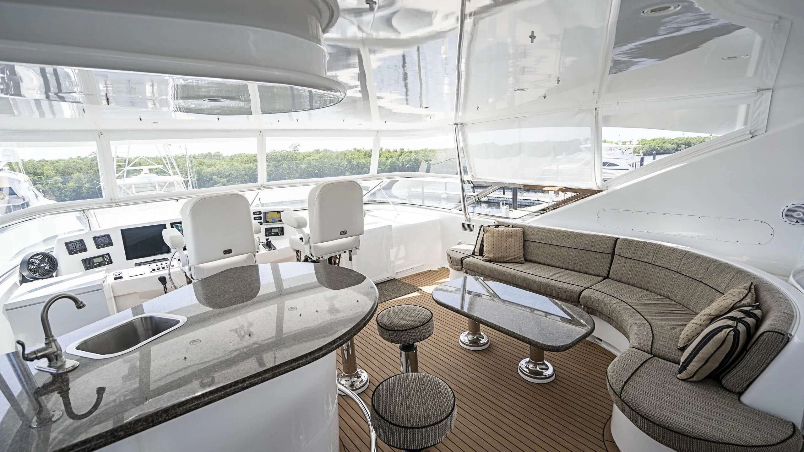 a living room with a large window aboard AL-JUBAIL Yacht for Sale