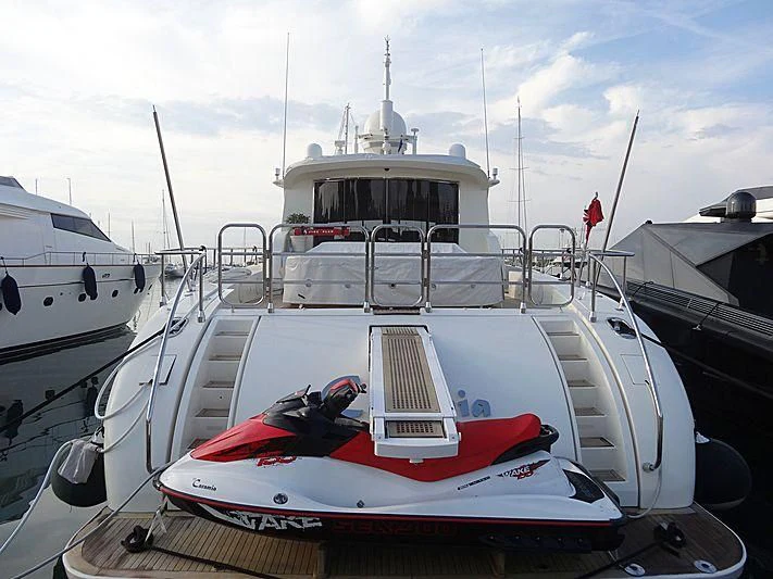 a boat docked at a pier aboard PALOMA Yacht for Sale