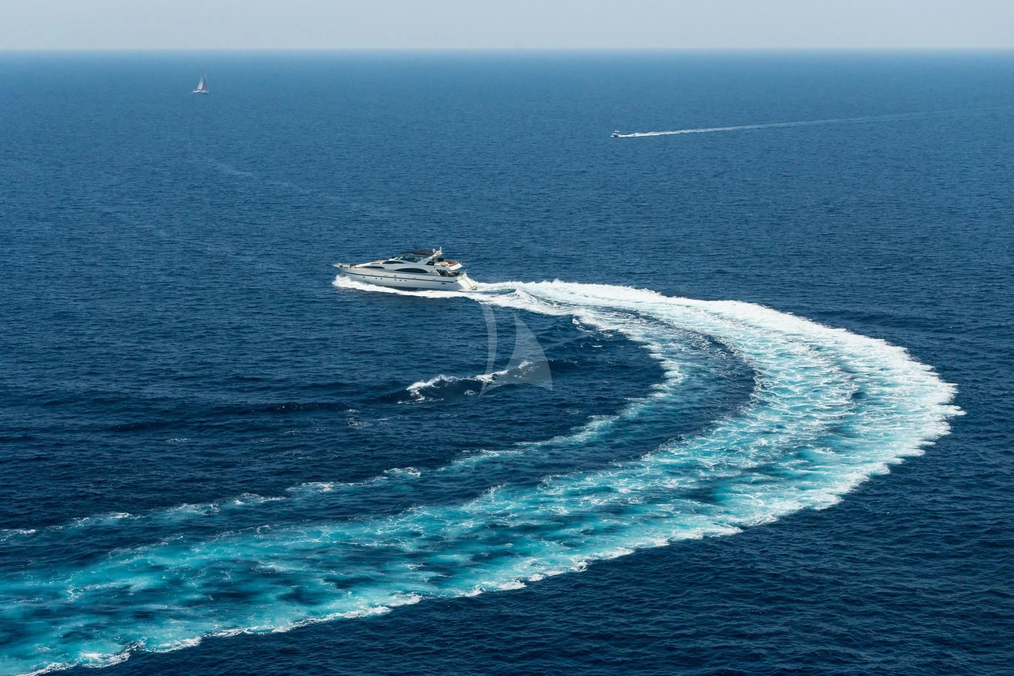 a large wave in the ocean aboard ACCAMA DELTA Yacht for Sale