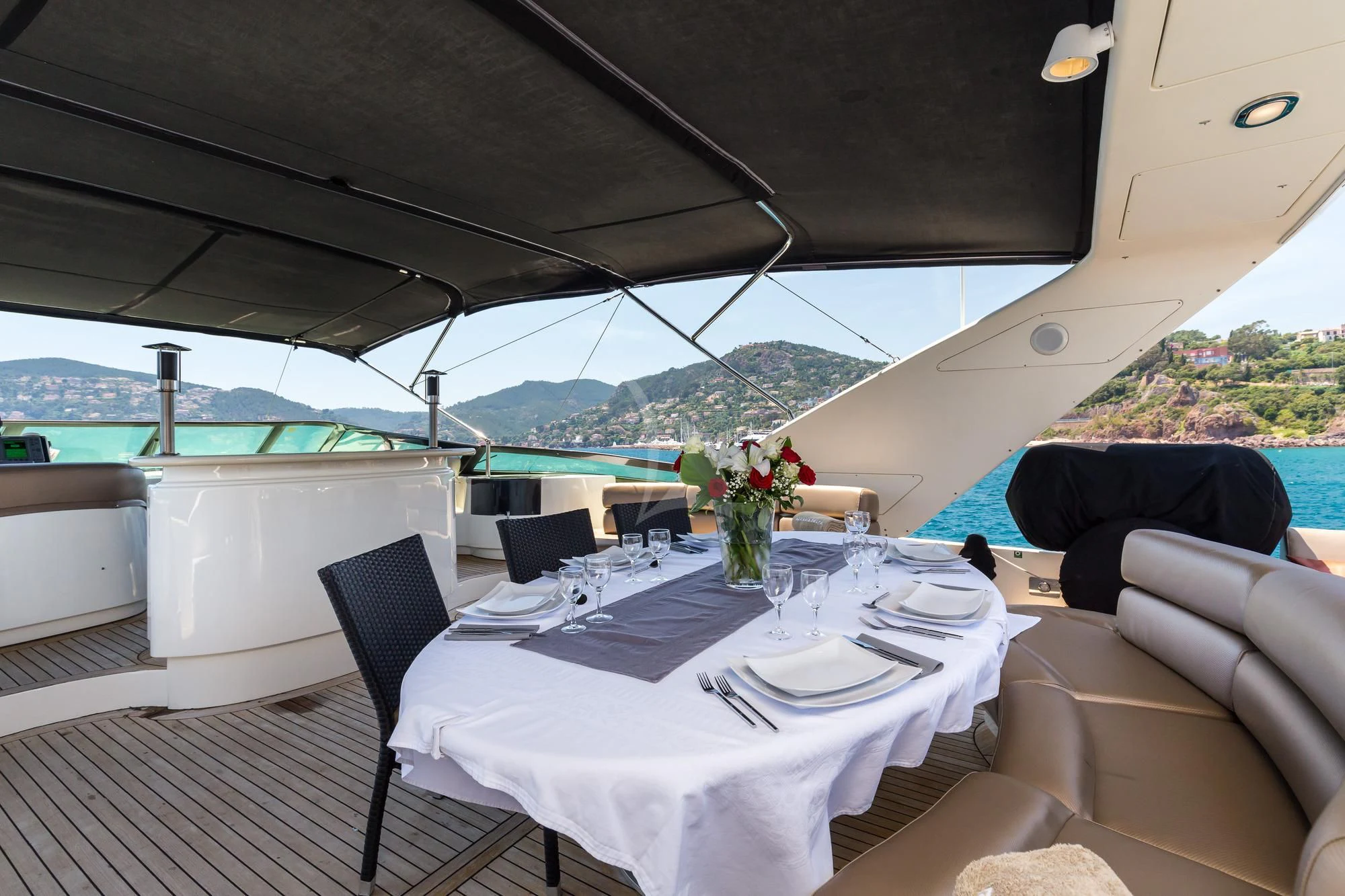 a table set for a meal aboard ACCAMA DELTA Yacht for Sale