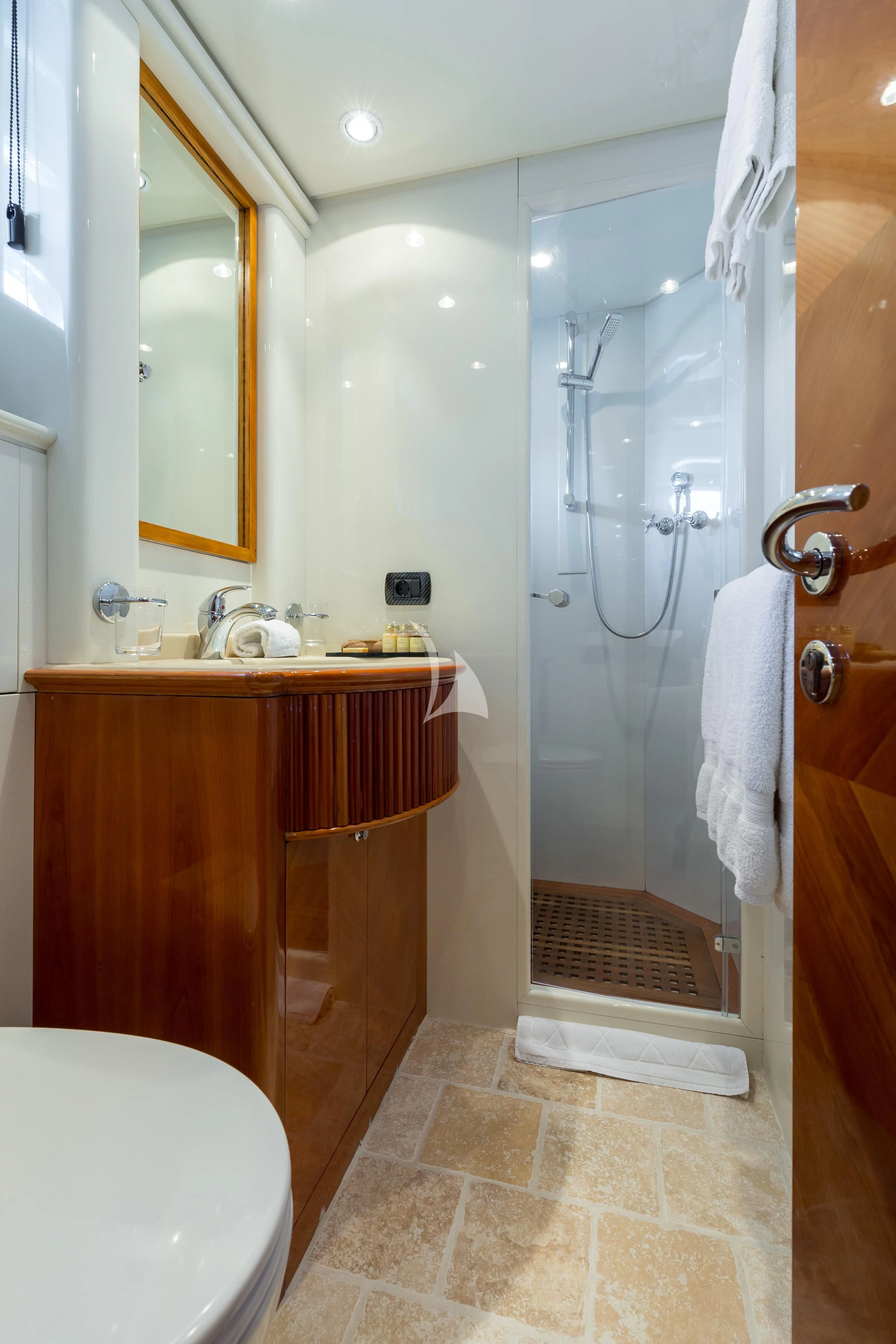 a bathroom with a shower and sink aboard ACCAMA DELTA Yacht for Sale