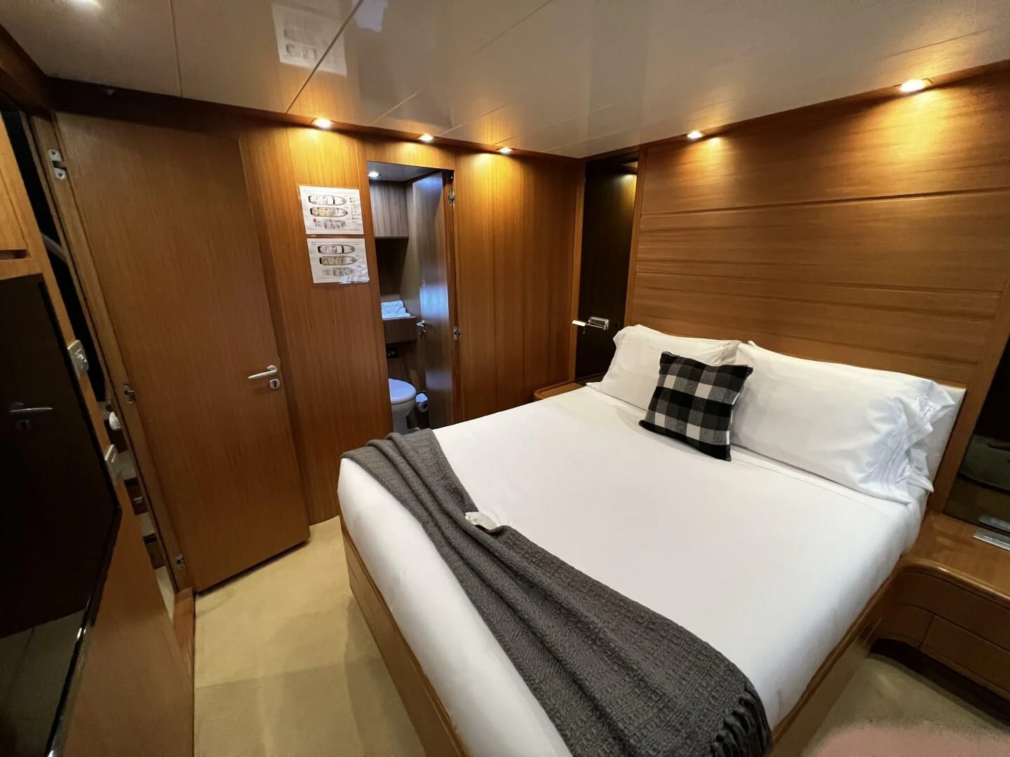 a hotel room with a bed aboard KOKO Yacht for Sale