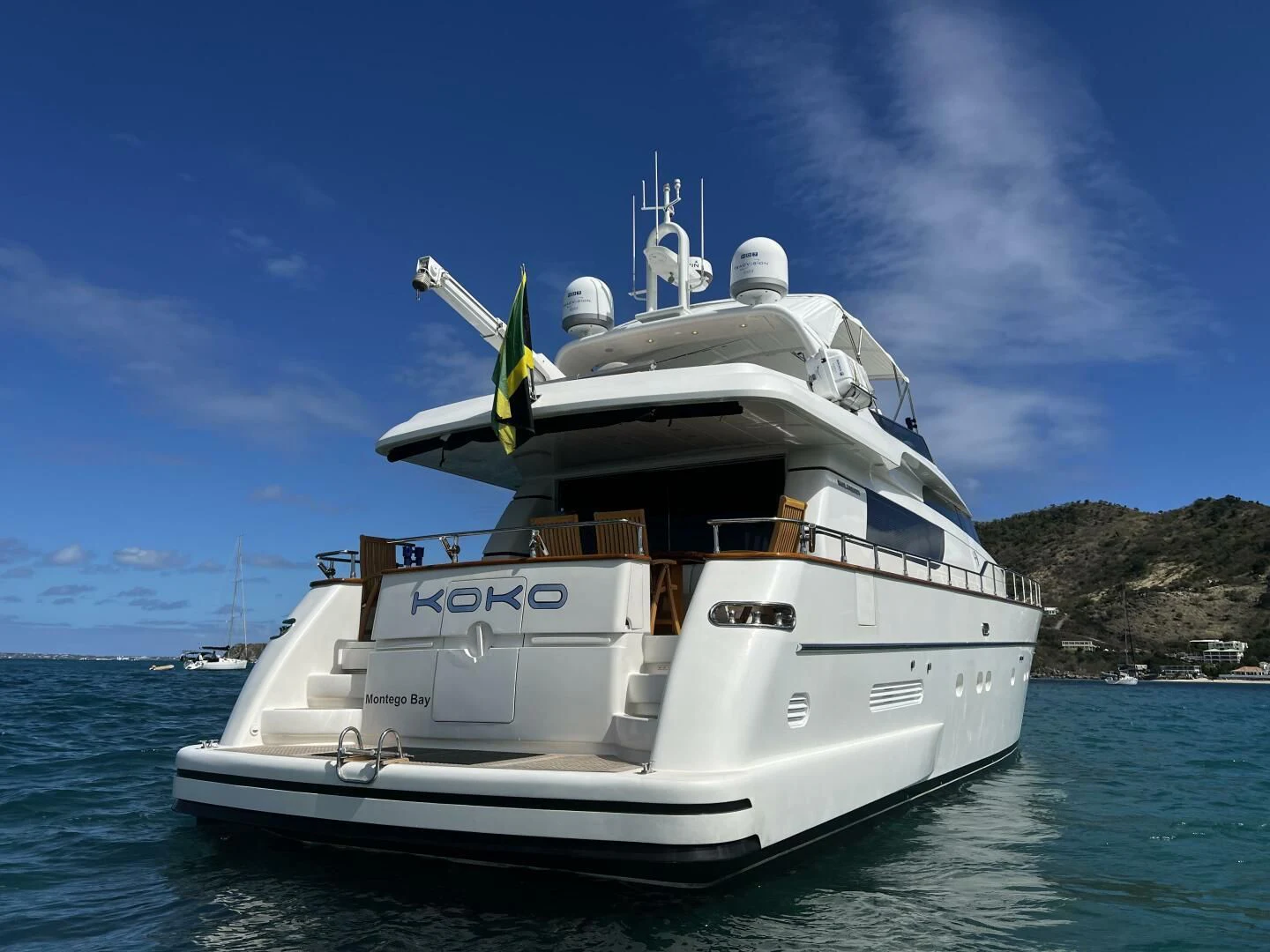a white boat in the water aboard KOKO Yacht for Sale