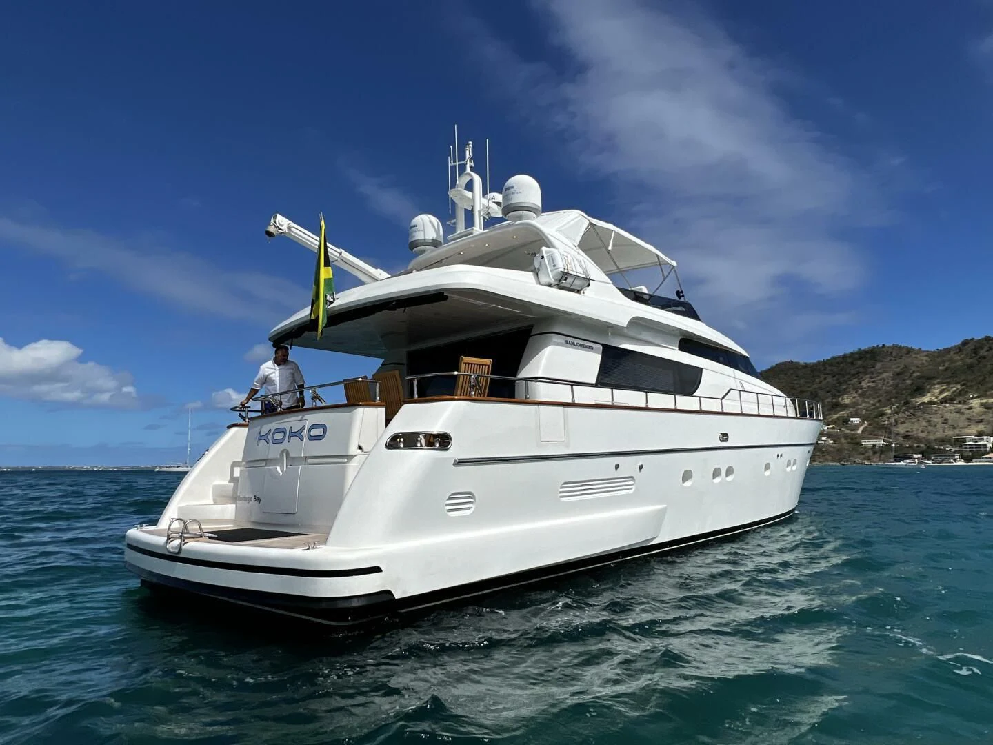 a white boat in the water aboard KOKO Yacht for Sale