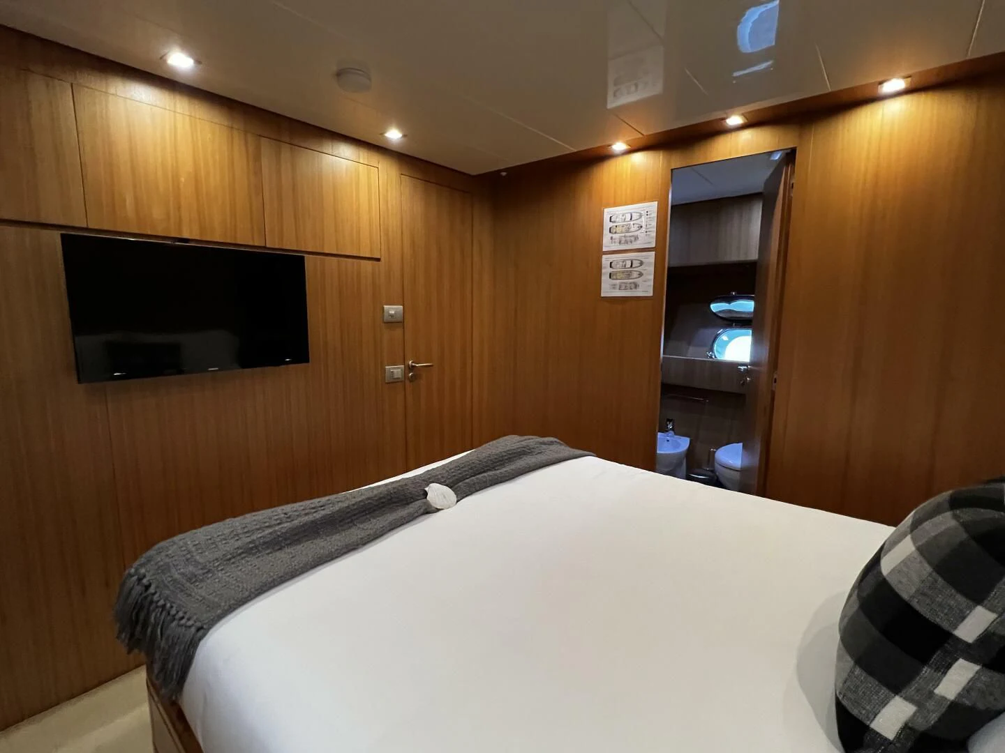a bed in a room aboard KOKO Yacht for Sale