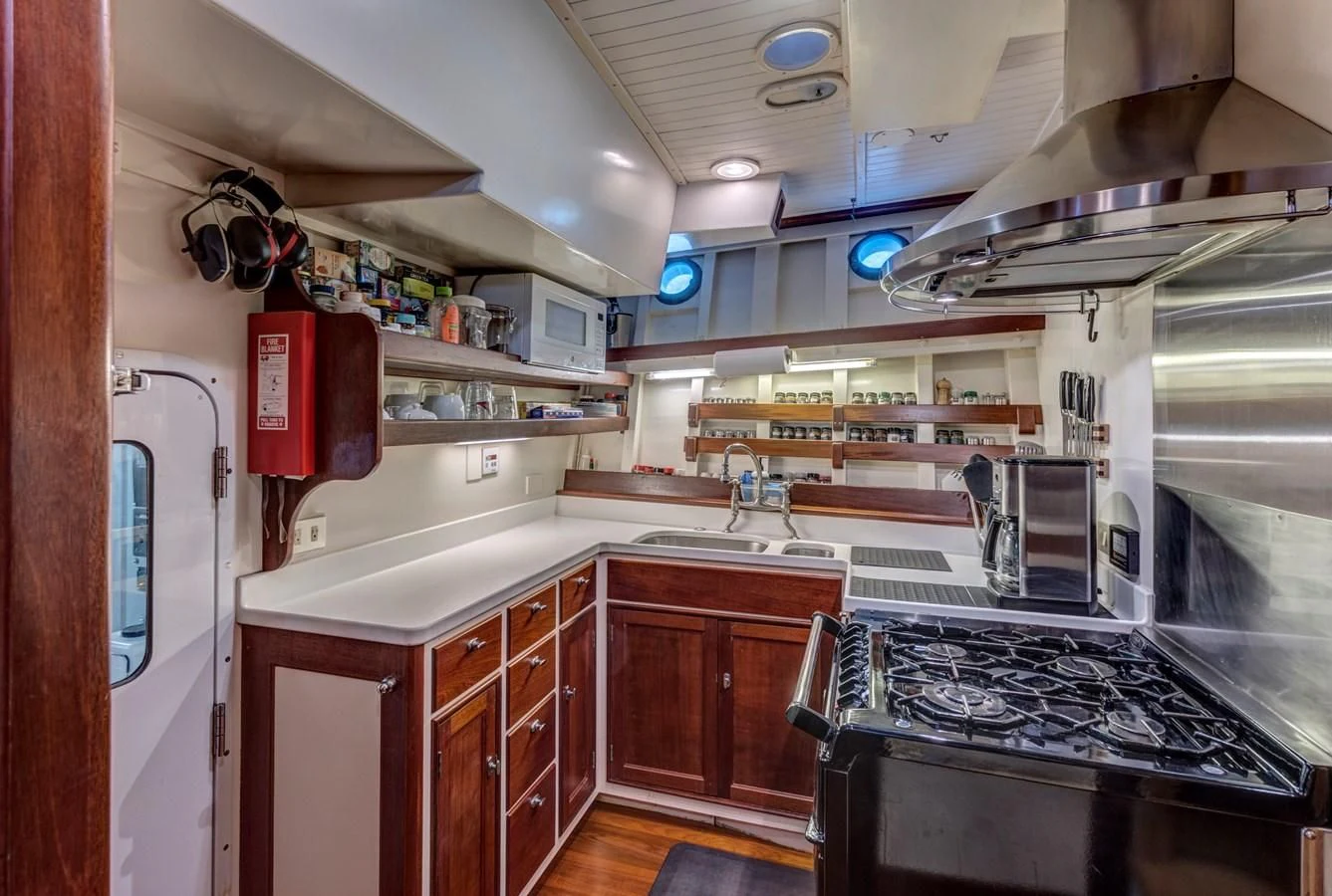 a kitchen with a stove and oven aboard ANNABELLE Yacht for Sale