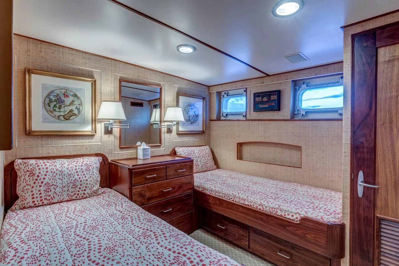 a bedroom with a bed and a dresser aboard ANNABELLE Yacht for Sale